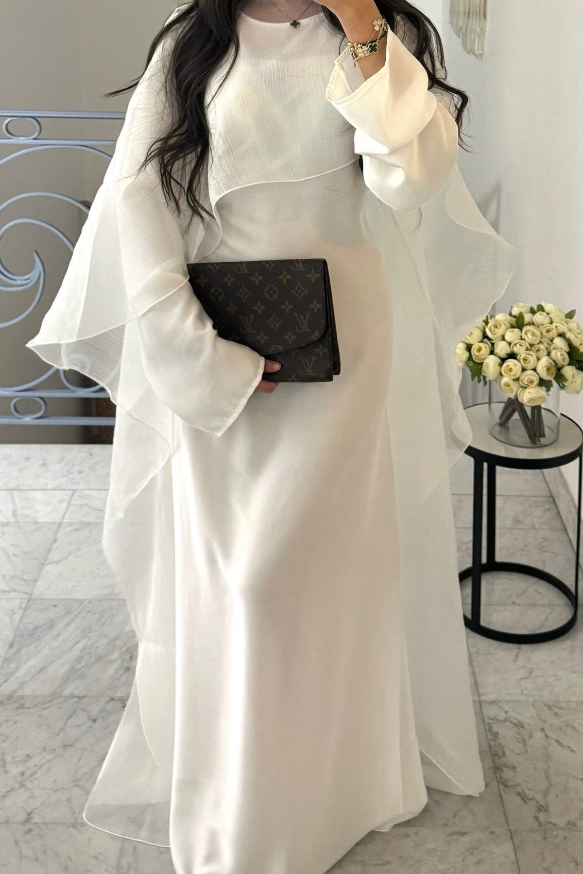 Cape-Kleid Manama